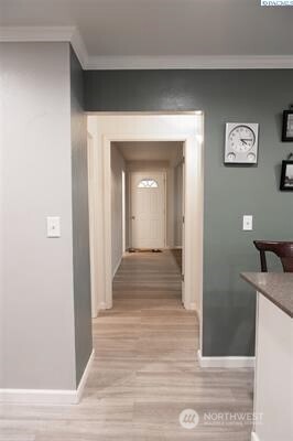 304 East 2nd Street Prescott, WA 99348 - Photo 12 of 24 a view of a hallway with wooden floor and closet