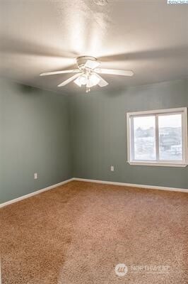 304 East 2nd Street Prescott, WA 99348 - Photo 20 of 24 a view of an empty room with a window