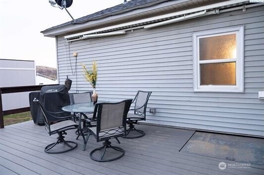 304 East 2nd Street Prescott, WA 99348 - Photo 21 of 24 a view of table and chairs in wooden floor