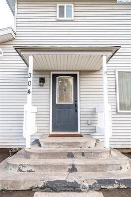 304 East 2nd Street Prescott, WA 99348 - Photo 4 of 24 a front view of a house