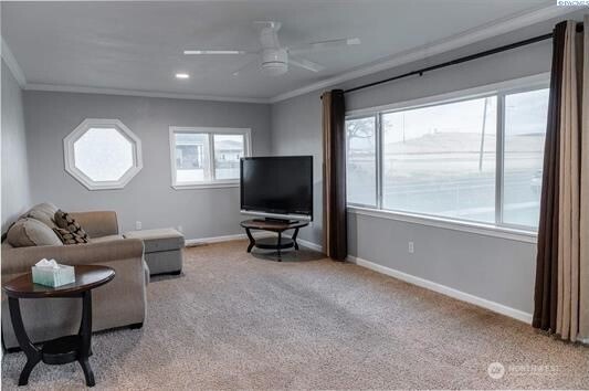 304 East 2nd Street Prescott, WA 99348 - Photo 9 of 24 a living room with furniture and a flat screen tv