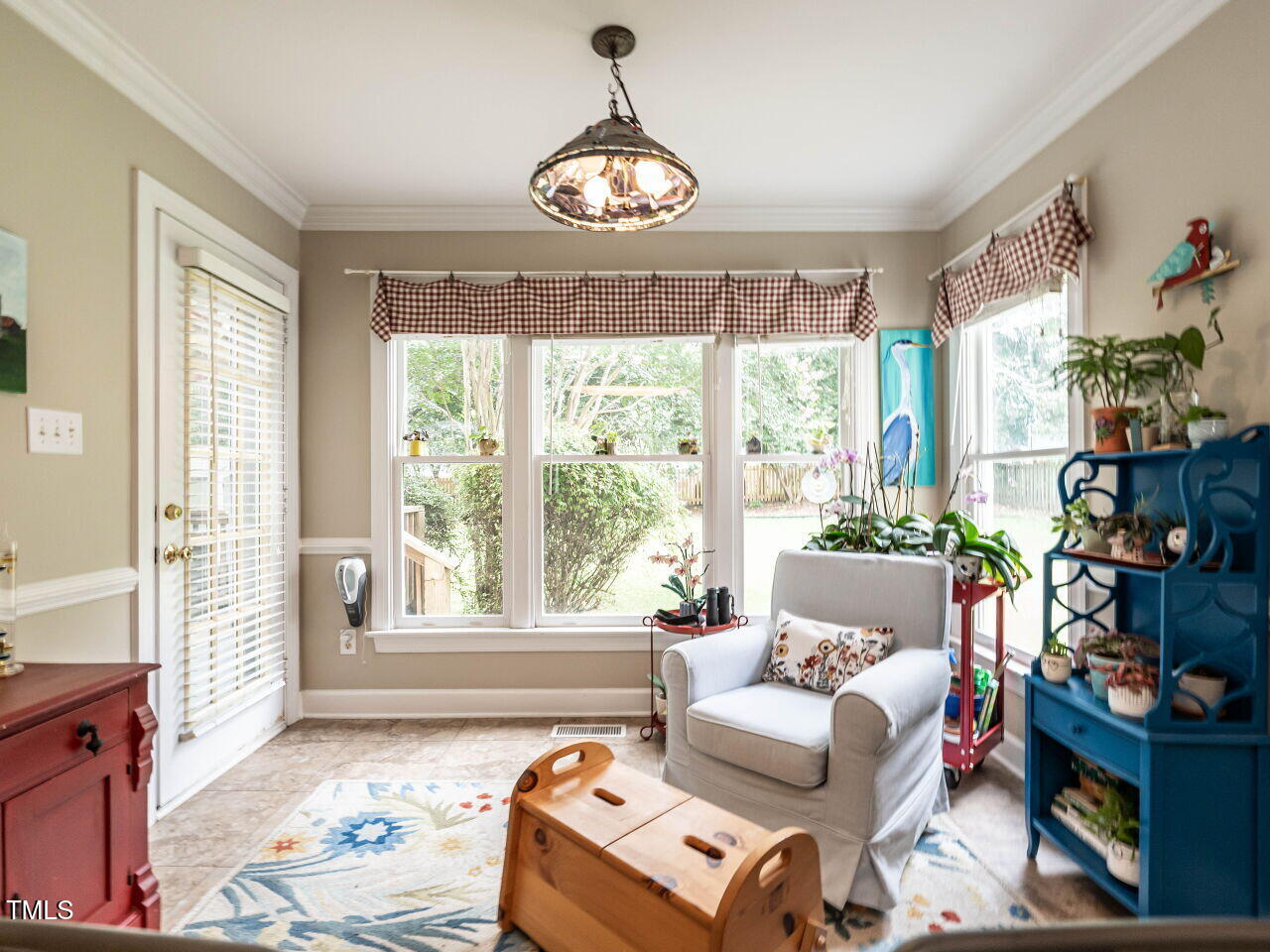 9205 Dawnshire Road Raleigh, NC 27615 - Photo 15 of 30 a living room with furniture and a large window