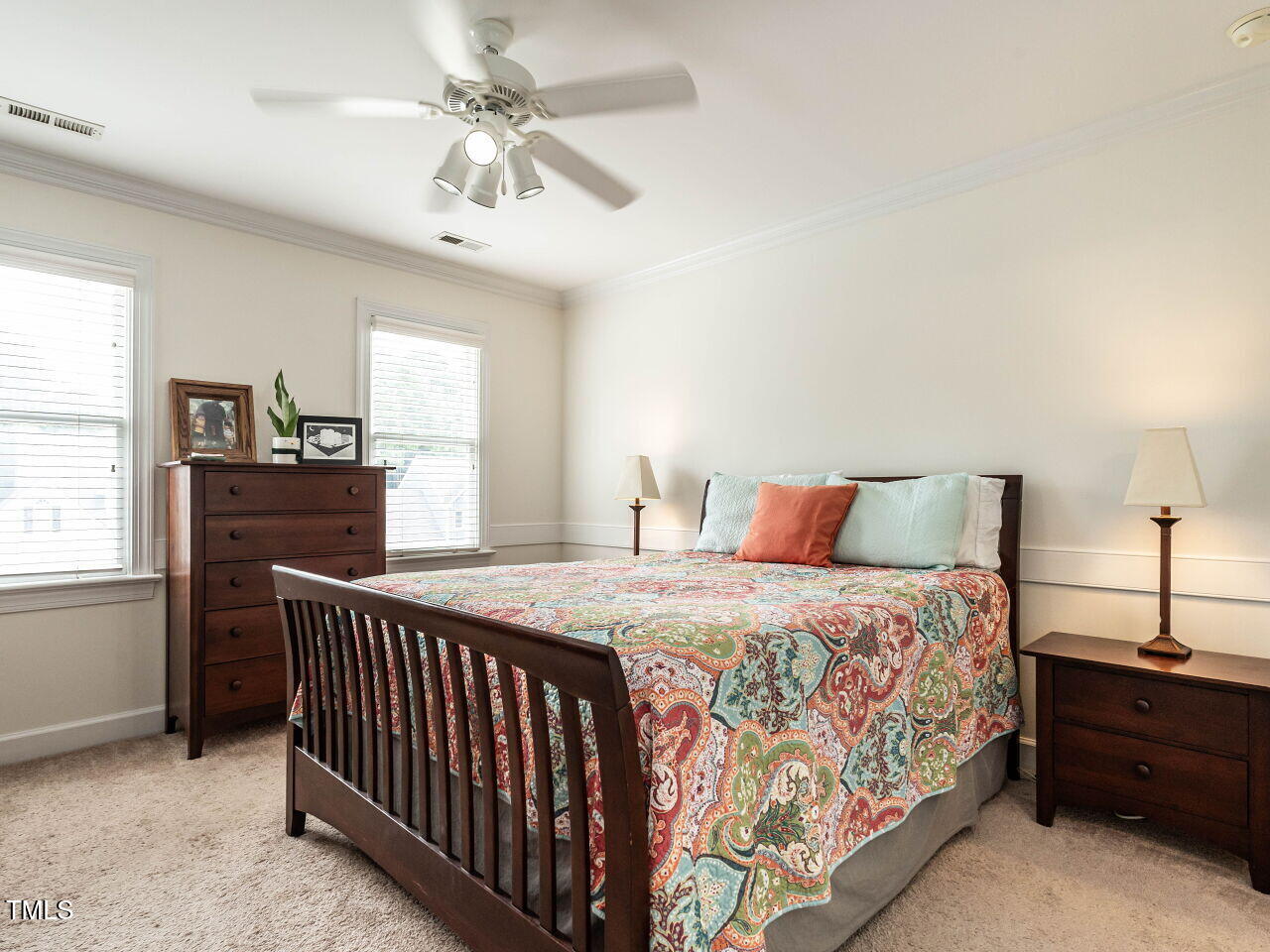9205 Dawnshire Road Raleigh, NC 27615 - Photo 17 of 30 a bedroom with a bed and window