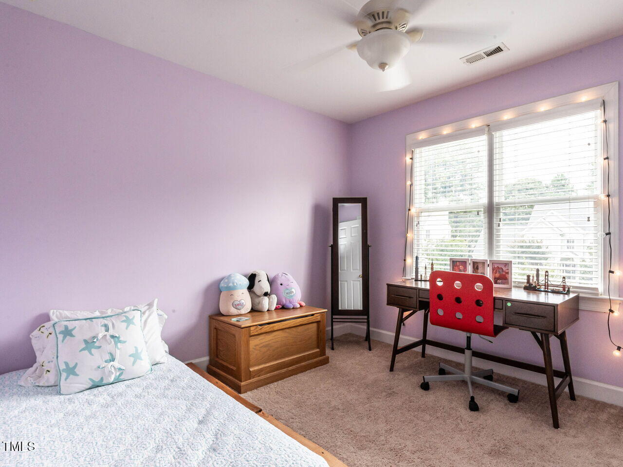 9205 Dawnshire Road Raleigh, NC 27615 - Photo 20 of 30 a bedroom with furniture and a large window