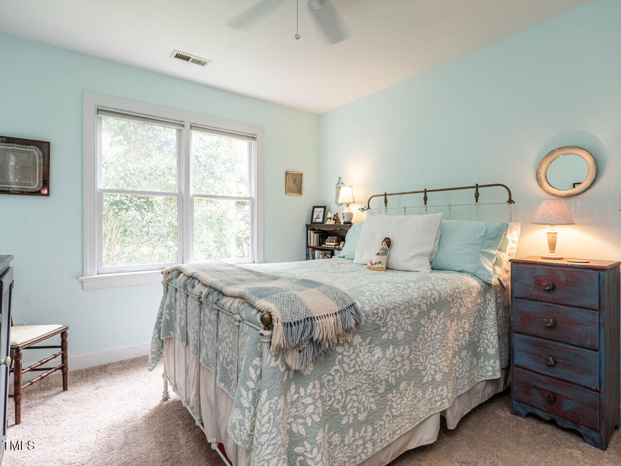 9205 Dawnshire Road Raleigh, NC 27615 - Photo 22 of 30 a bedroom with a bed and a window