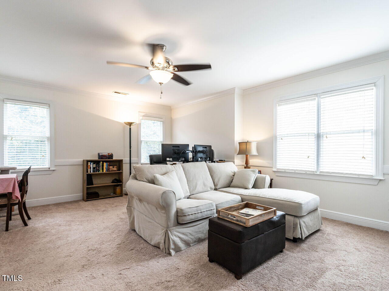 9205 Dawnshire Road Raleigh, NC 27615 - Photo 23 of 30 a living room with furniture and a large window