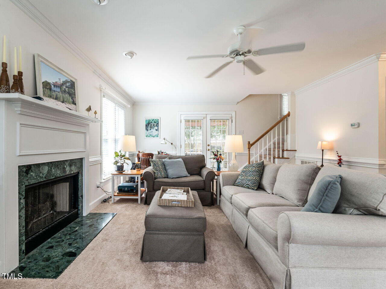 9205 Dawnshire Road Raleigh, NC 27615 - Photo 7 of 30 a living room with furniture and a fireplace