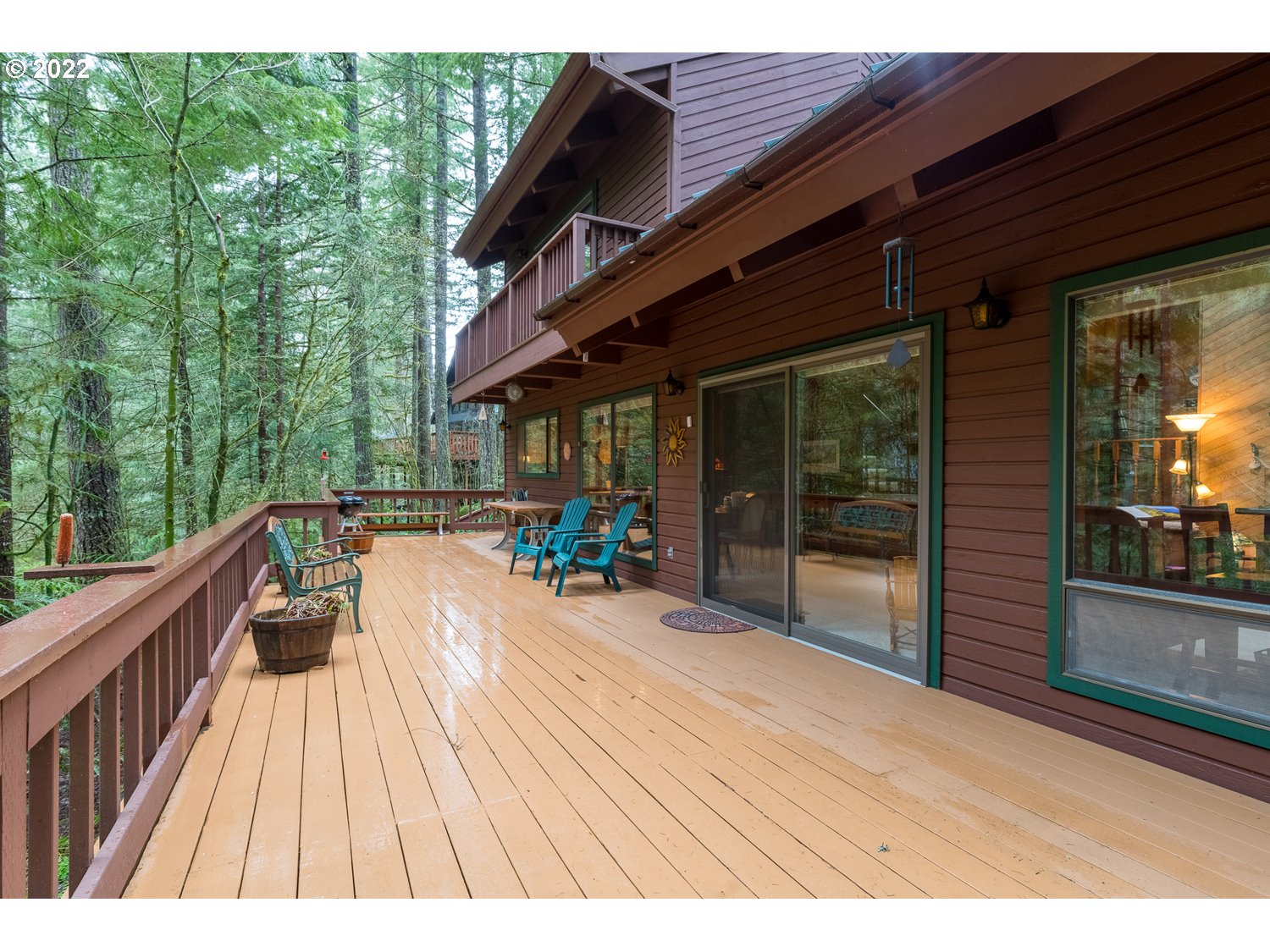 72671 East Village Loop Road Rhododendron, OR 97049 - Photo 4 of 32 a terrace with outdoor seating and trees