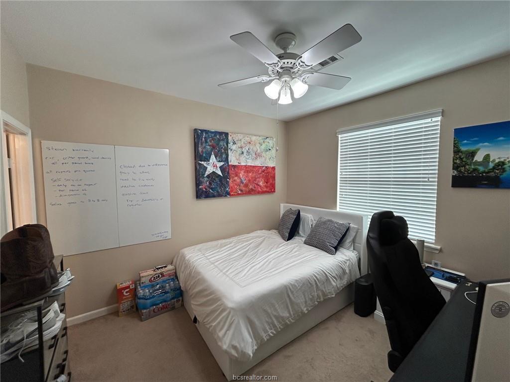 300 Ash Street, Unit B College Station, TX 77840 - Photo 7 of 23 a bedroom with a bed and a window