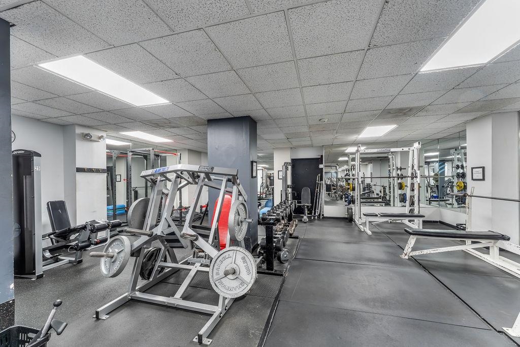 2110 Harmon Cove Tower Secaucus, NJ 07094 - Photo 43 of 50 a view of a room with gym equipment