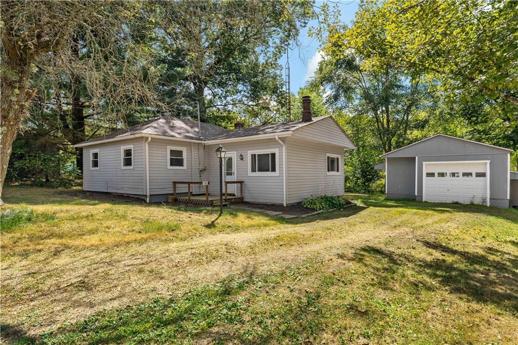 130 Patton Lane Clinton, PA 15026 - Photo 1 of 36 a view of a house with a yard and large tree