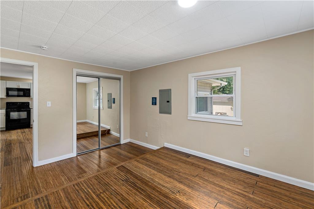 130 Patton Lane Clinton, PA 15026 - Photo 11 of 36 a view of empty room with wooden floor and fan