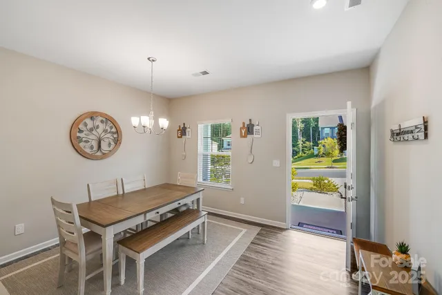 a room with a table and a clock