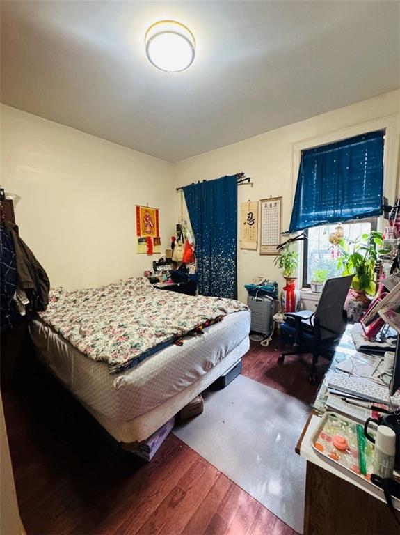 328 91st Street Brooklyn, NY 11209 - Photo 12 of 27 a bedroom with a bed window and couch