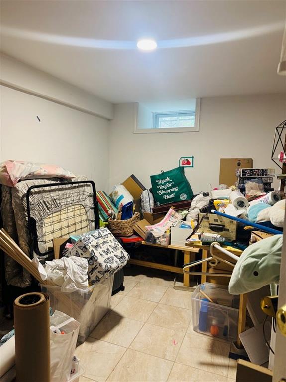 328 91st Street Brooklyn, NY 11209 - Photo 22 of 27 a bed room with a bed and a couch