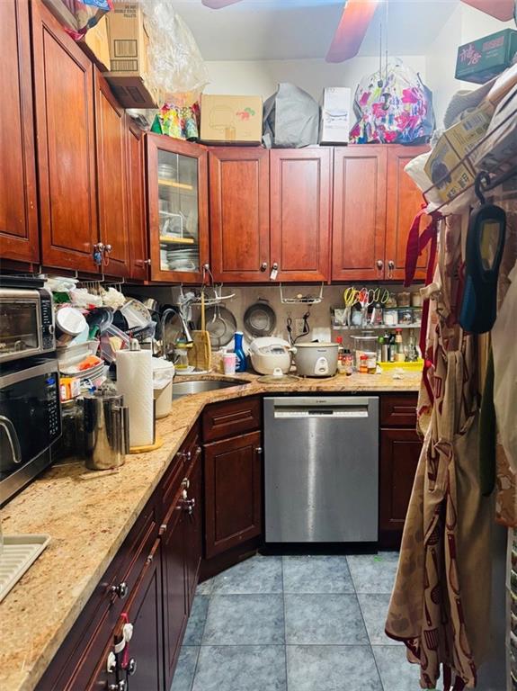 328 91st Street Brooklyn, NY 11209 - Photo 9 of 27 a kitchen with a sink and cabinets