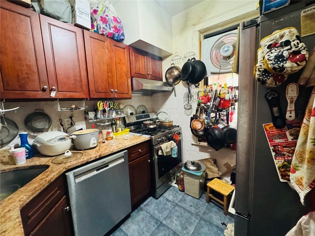 328 91st Street Brooklyn, NY 11209 - Photo 10 of 27 a view of a kitchen with appliances and cabinets