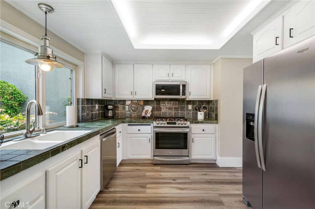 109 Cinnamon Ridge Road Brea, CA 92821 - Photo 2 of 67 View of kitchen including stainless steel refrigerator.