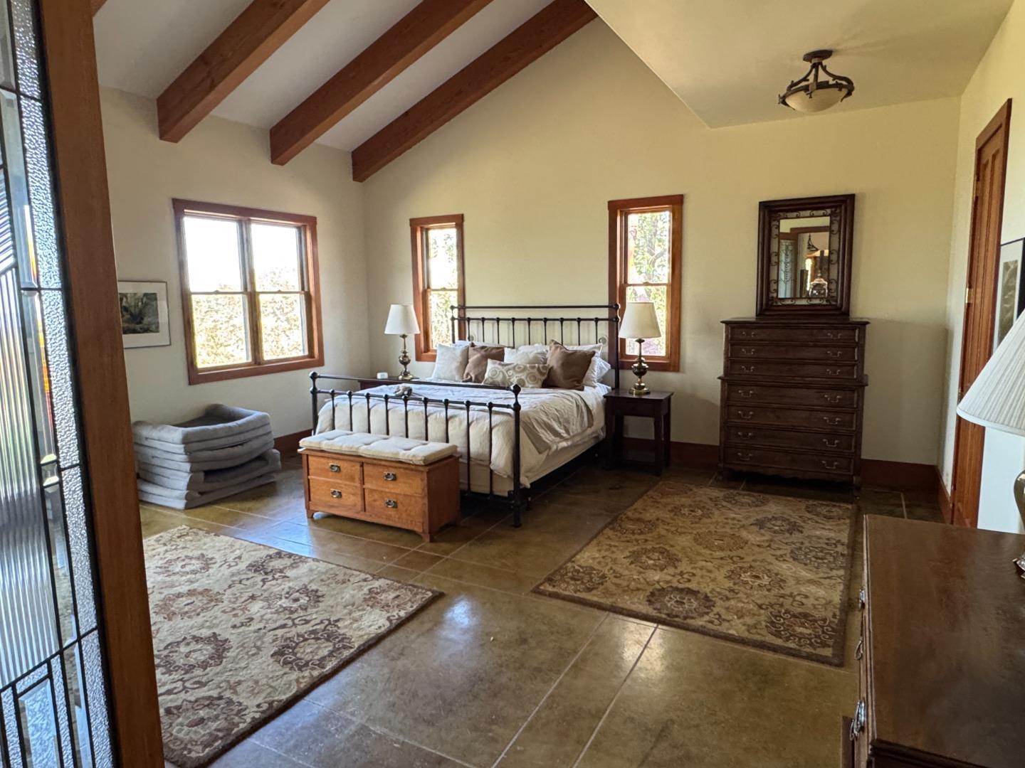 2251 Folendorf Road Murphys, CA 95247 - Photo 6 of 39 a bedroom with furniture and a fireplace