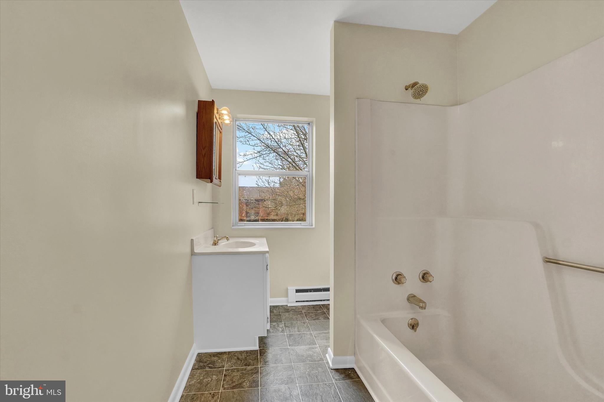 3530 Middleboro Road Dover, PA 17315 - Photo 18 of 32 a bathroom with a bathtub and sink