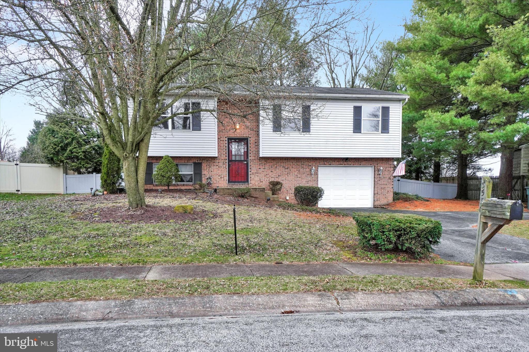 3530 Middleboro Road Dover, PA 17315 - Photo 2 of 32 a front view of a house with garden