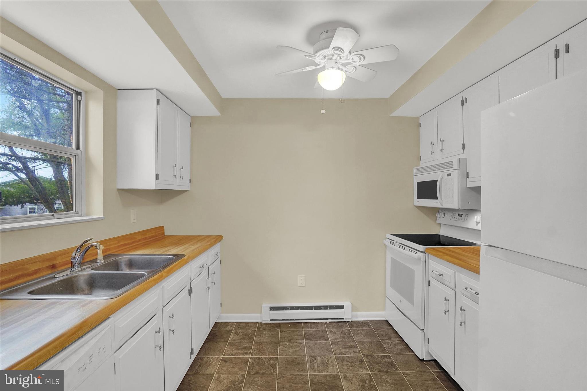 3530 Middleboro Road Dover, PA 17315 - Photo 9 of 32 a kitchen with stainless steel appliances granite countertop a sink stove and cabinets