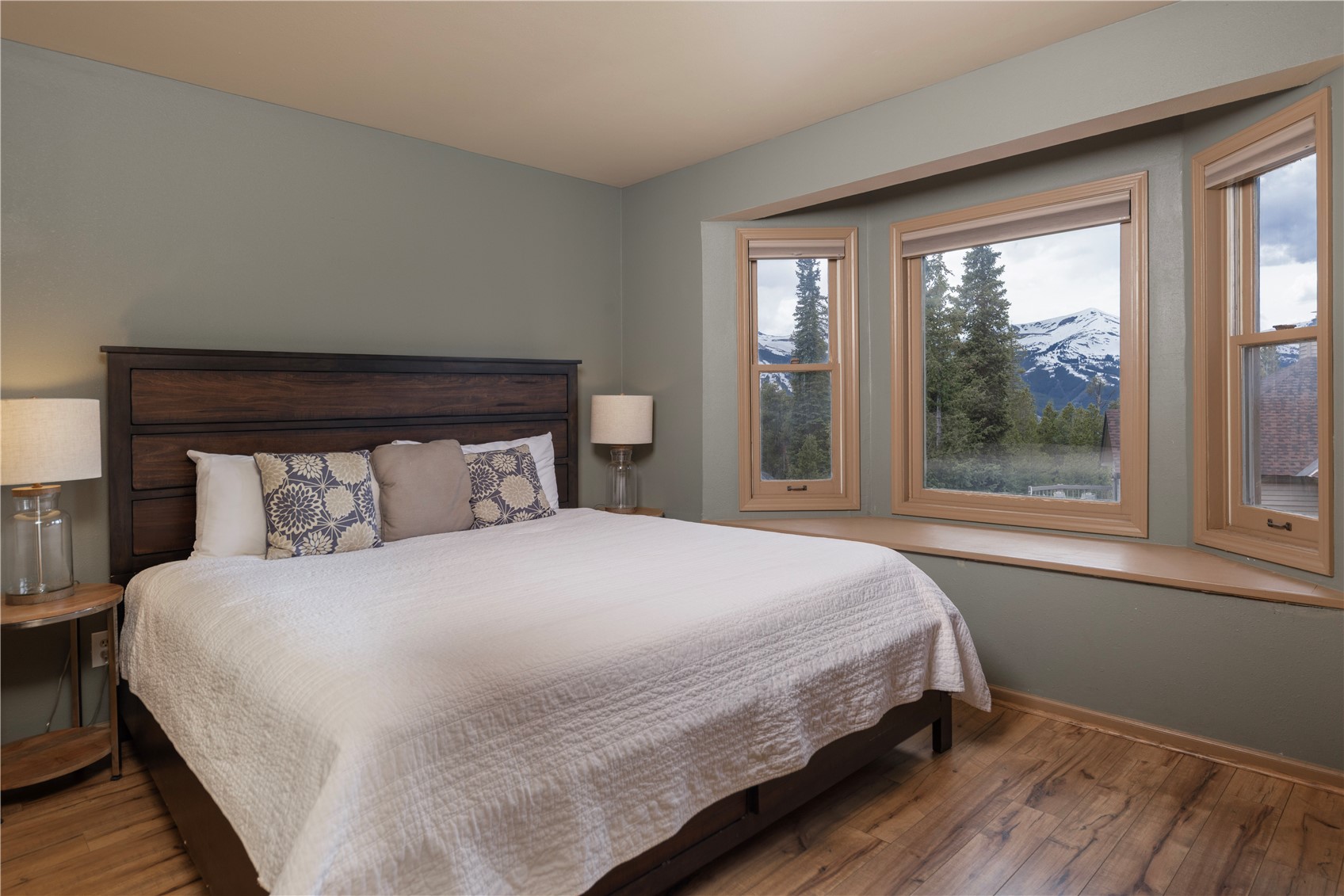 1120 Baldy Road, Unit 1120 Breckenridge, CO 80424 - Photo 19 of 38 The primary bedroom includes the same fabulous views as the living room. Wake each morning to these mountain views and get ready for a day of play on the mountain.