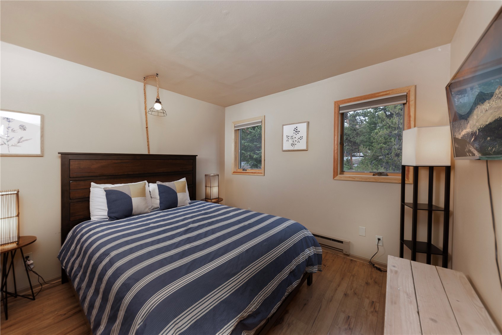 1120 Baldy Road, Unit 1120 Breckenridge, CO 80424 - Photo 23 of 38 The second bedroom offers a beautifully wooded setting just outside.