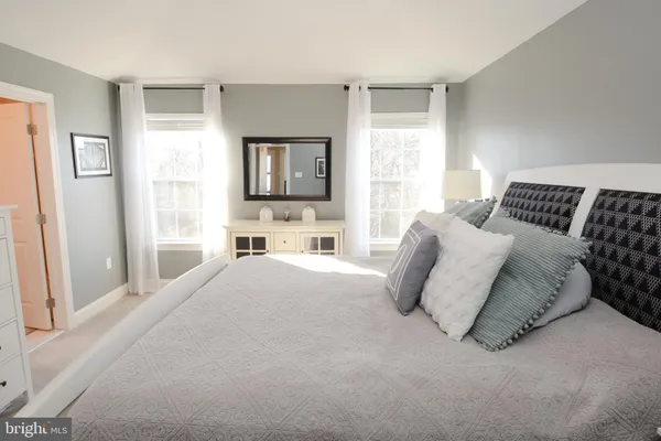 a view of a room that has a table and chair in it