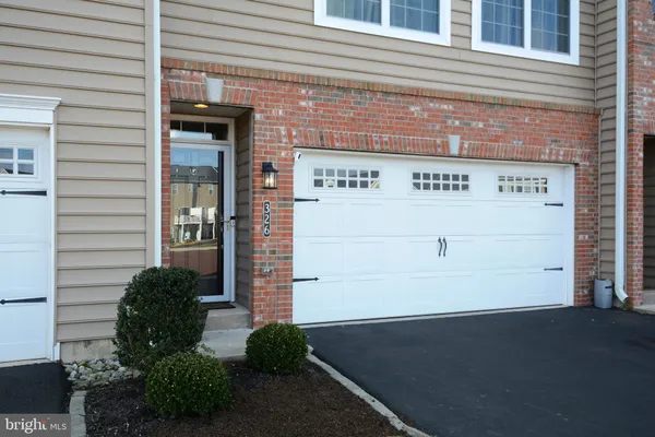 a front view of a house with a door