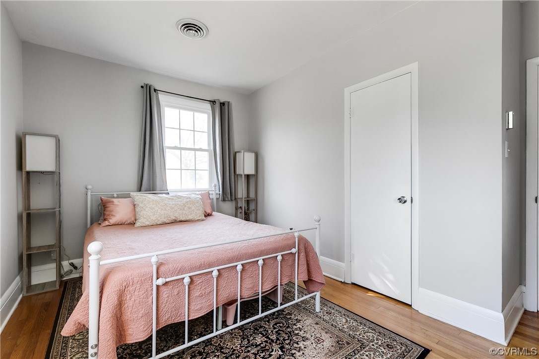 13409 Oak Lane Midlothian, VA 23113 - Photo 12 of 19 a bedroom with a bed and window