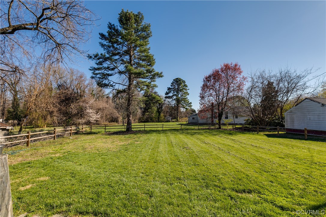 13409 Oak Lane Midlothian, VA 23113 - Photo 19 of 19 a view of a swimming pool with an outdoor space and seating area