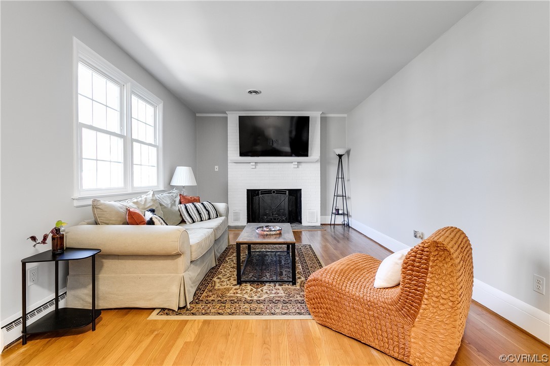 13409 Oak Lane Midlothian, VA 23113 - Photo 2 of 19 a living room with furniture and a flat screen tv