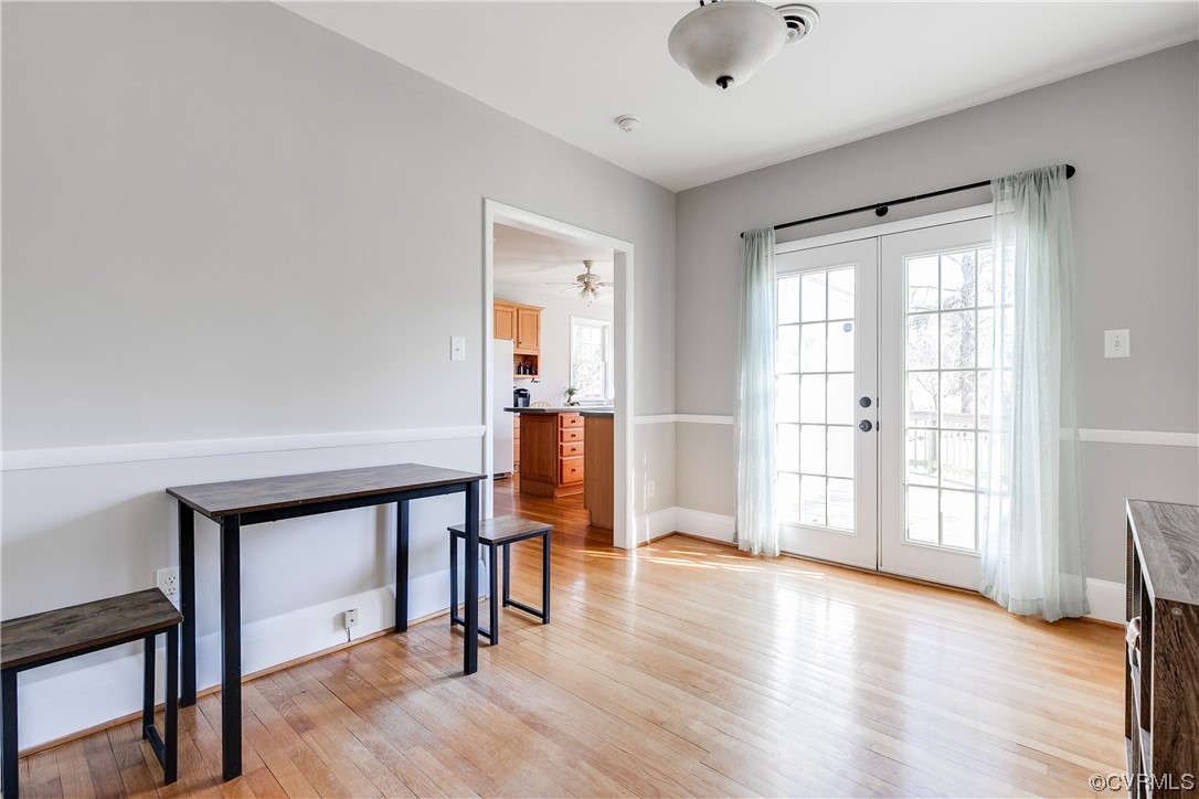 13409 Oak Lane Midlothian, VA 23113 - Photo 5 of 19 a view of empty room with wooden floor and fan