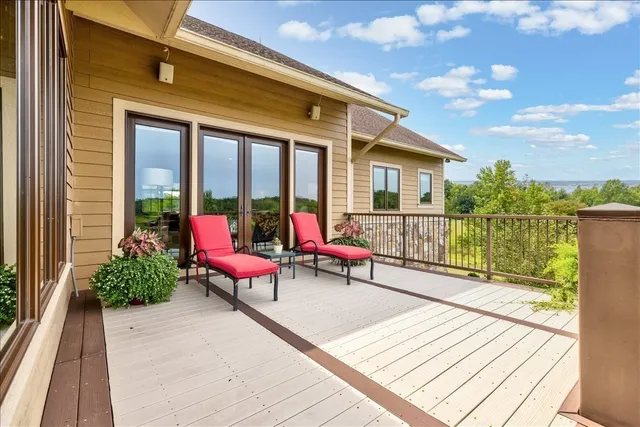 a view of a livingroom with furniture and a garage