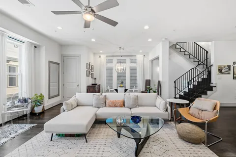 a kitchen with stainless steel appliances a refrigerator stove and microwave