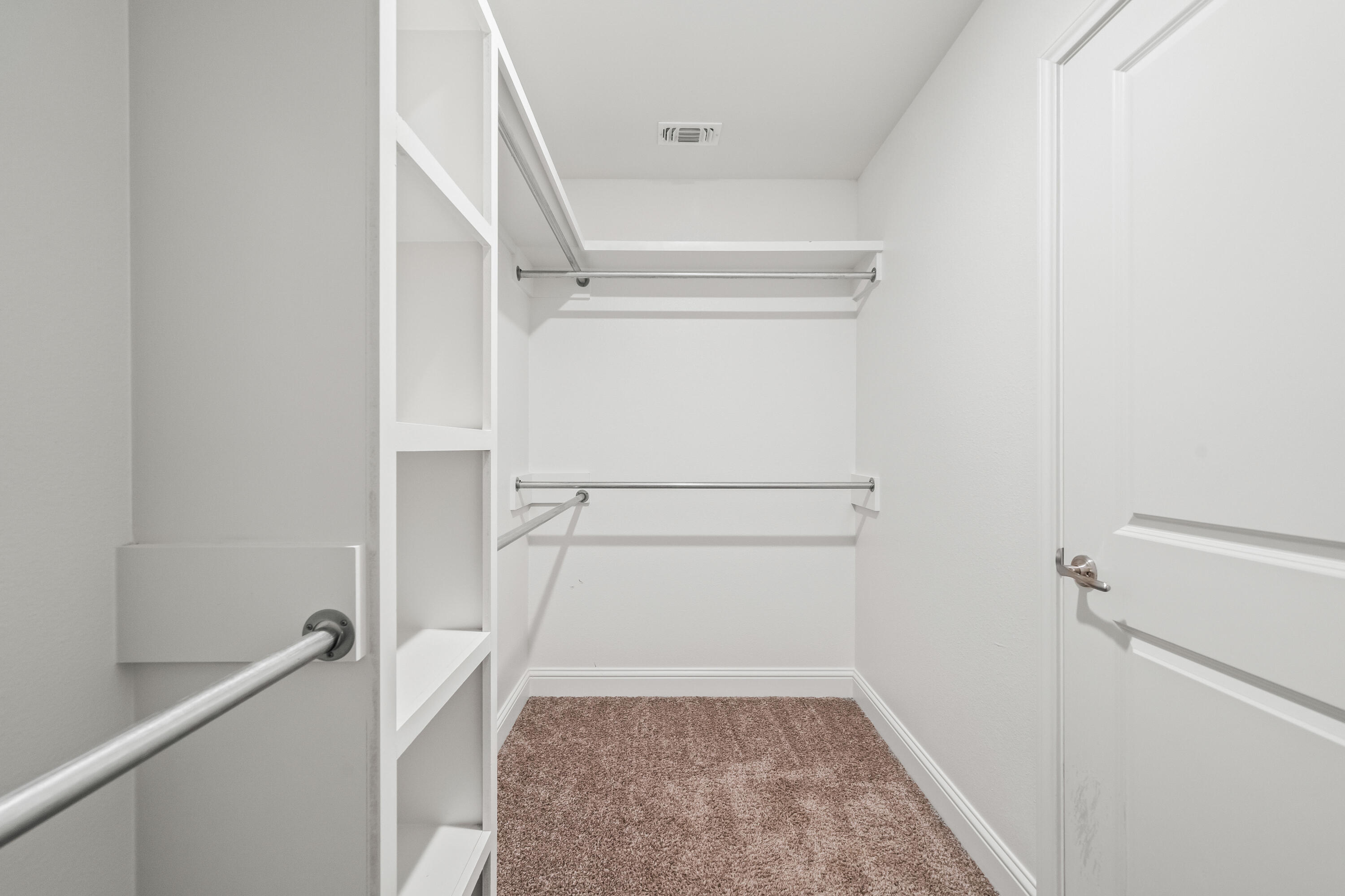 7523 87th Street Lubbock, TX 79424 - Photo 16 of 23 a view of walk in closet