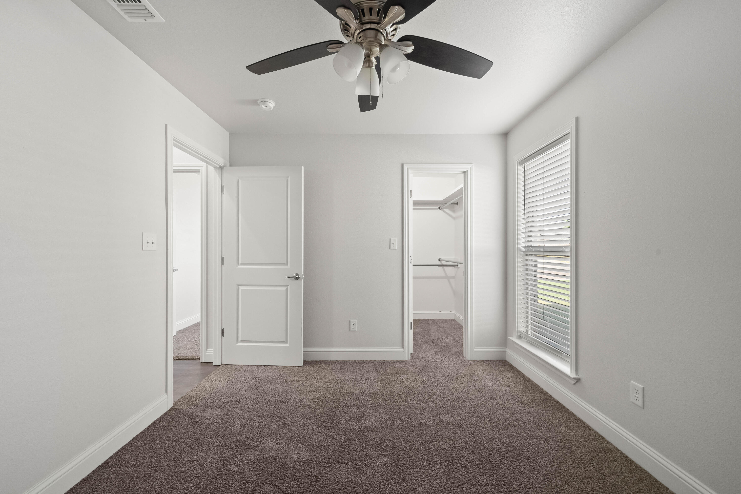 7523 87th Street Lubbock, TX 79424 - Photo 21 of 23 a view of an empty room and window