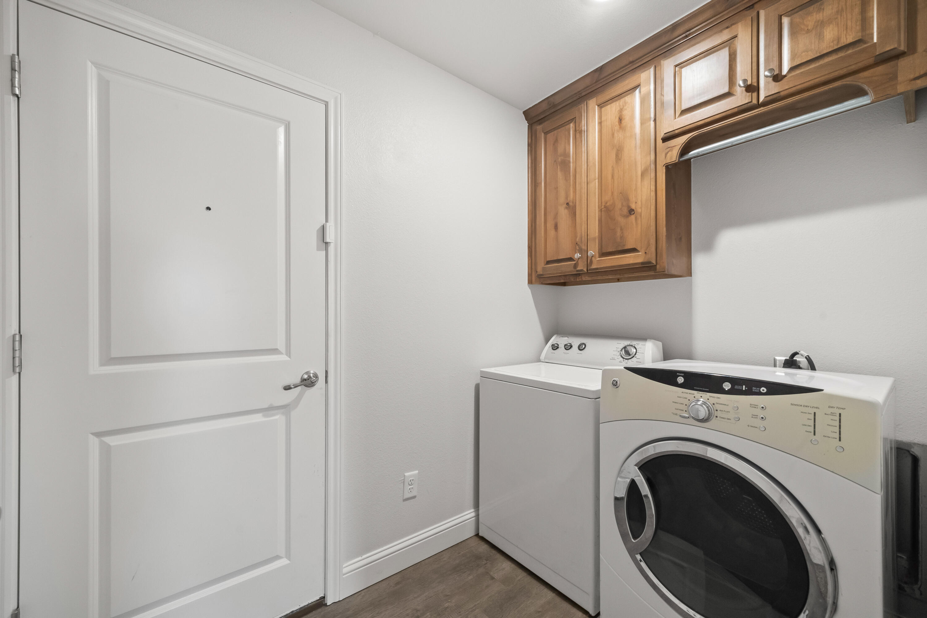 7523 87th Street Lubbock, TX 79424 - Photo 22 of 23 a utility room with dryer and washer
