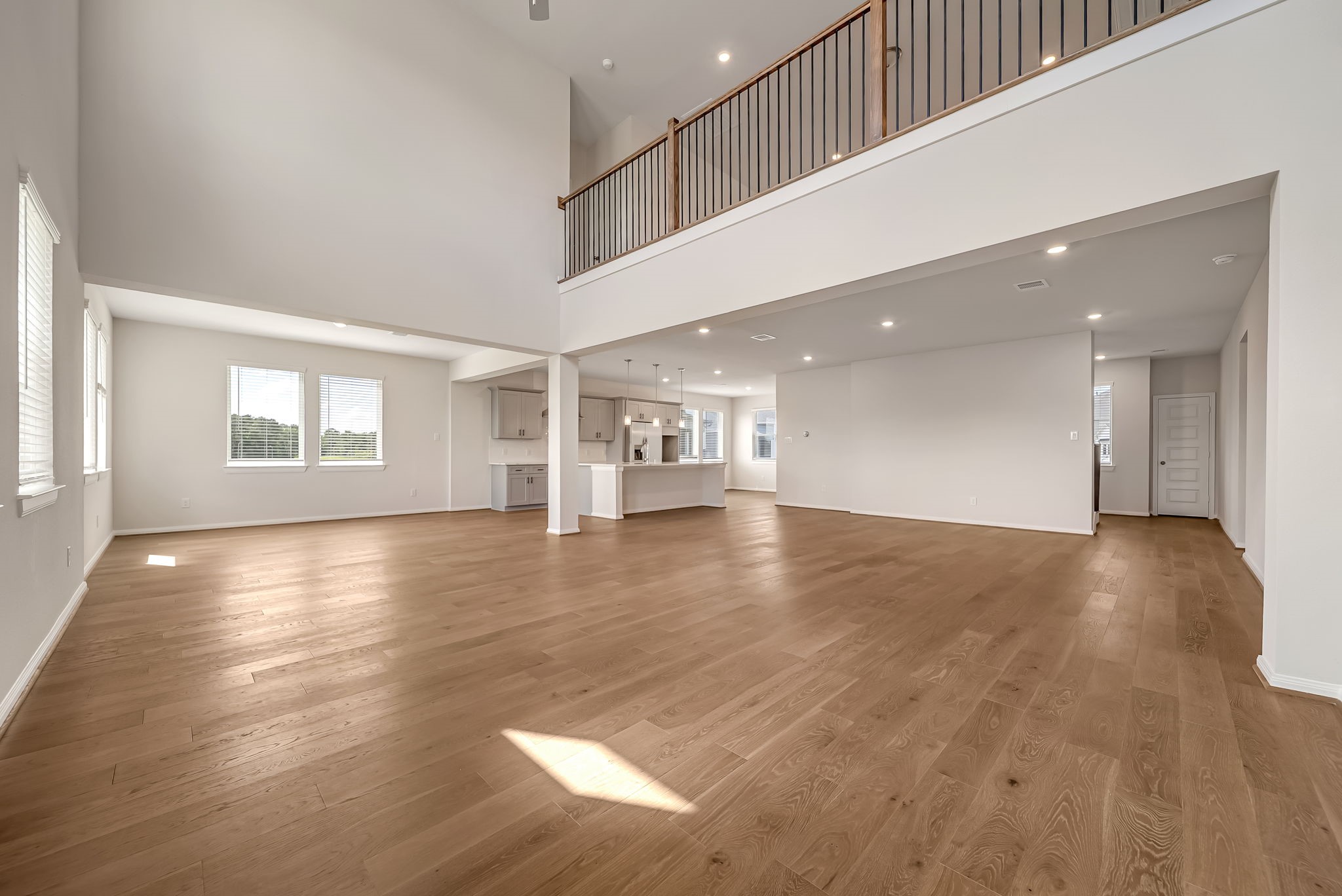 20629 Dynamic Court Humble, TX 77338 - Photo 7 of 26 a view of empty room with wooden floor and fan