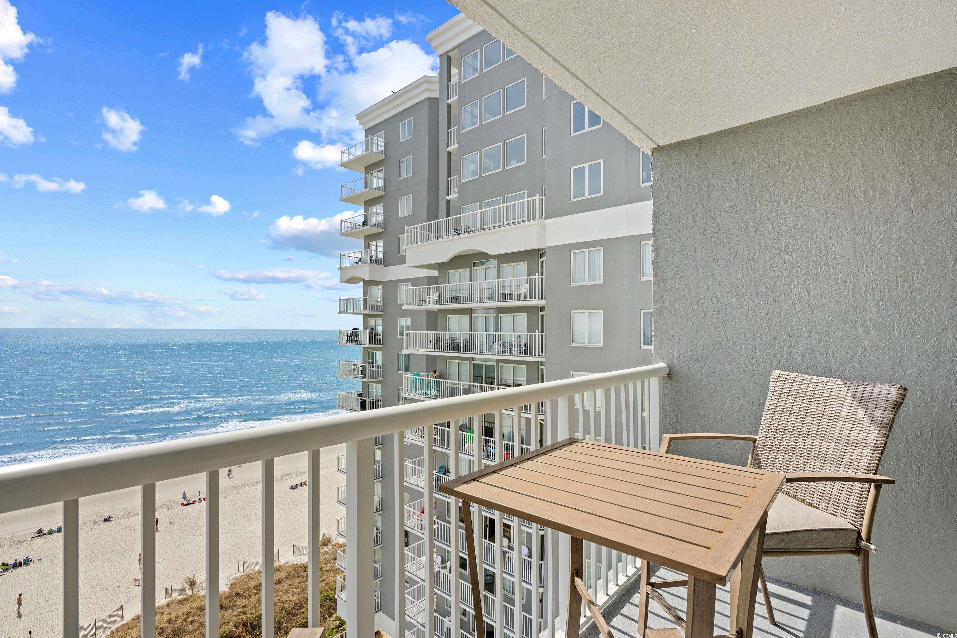 161 Seawatch Drive, Unit 1012 Myrtle Beach, SC 29572 - Photo 11 of 34 Balcony with view of water and beach