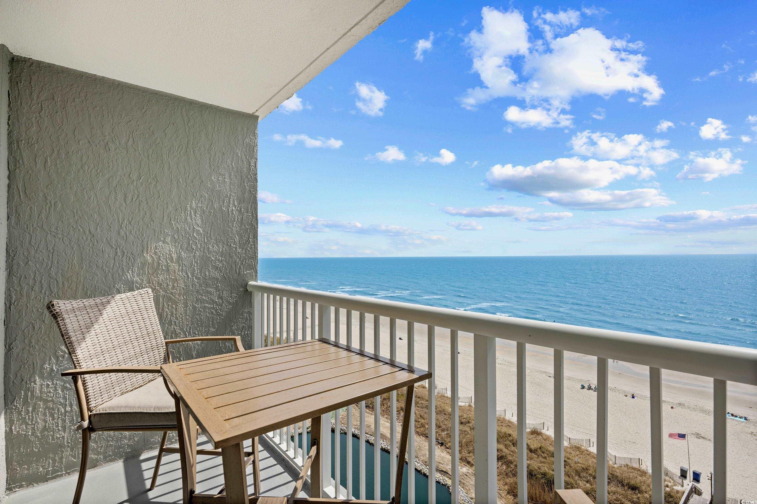 161 Seawatch Drive, Unit 1012 Myrtle Beach, SC 29572 - Photo 9 of 34 Balcony featuring view of water and beach