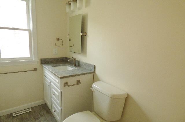 3 Circuit Road North West Yarmouth, MA 02673 - Photo 13 of 28 a bathroom with a granite countertop toilet and sink