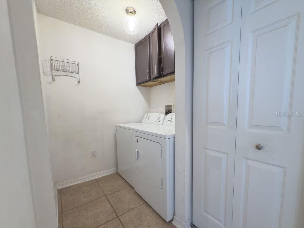 1723 Lochshyre Loop Ocoee, FL 34761 - Photo 19 of 23 a bathroom with a sink and a mirror