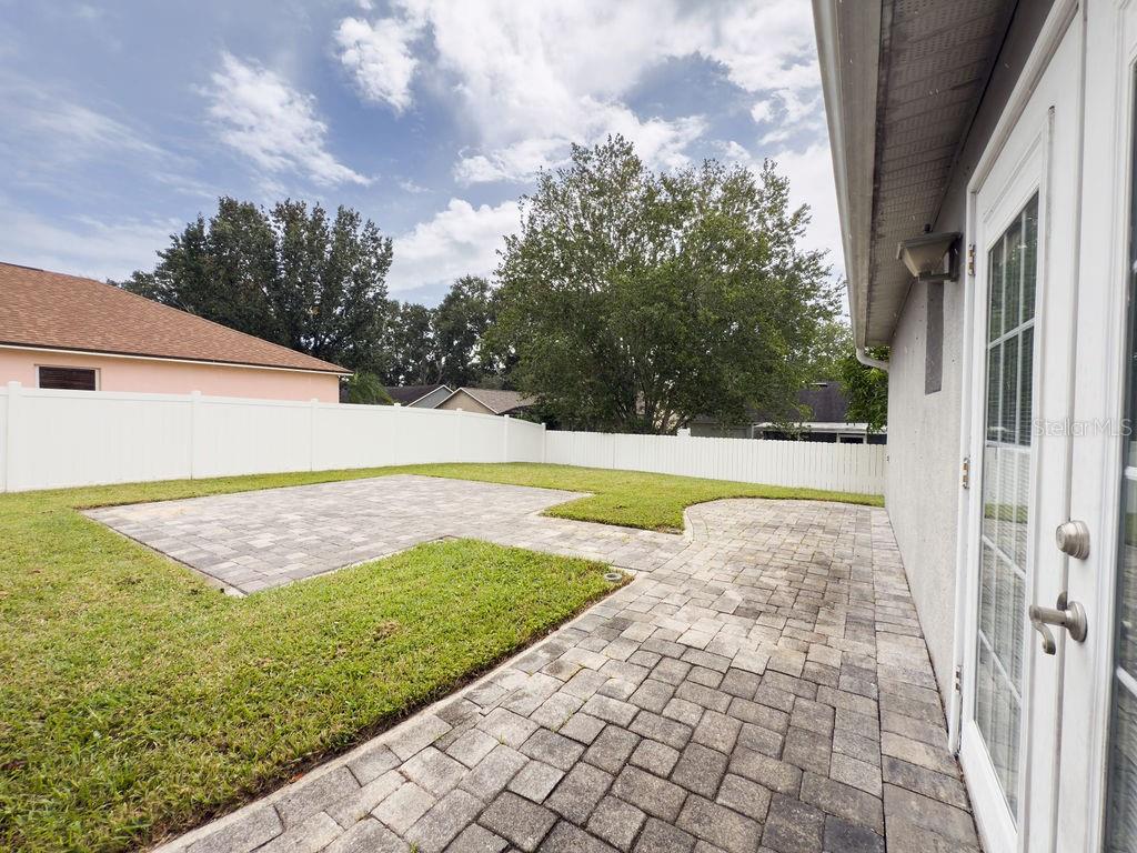 1723 Lochshyre Loop Ocoee, FL 34761 - Photo 20 of 23 a view of a backyard