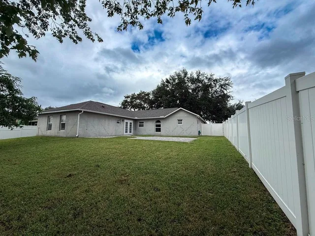 a house view with garden space