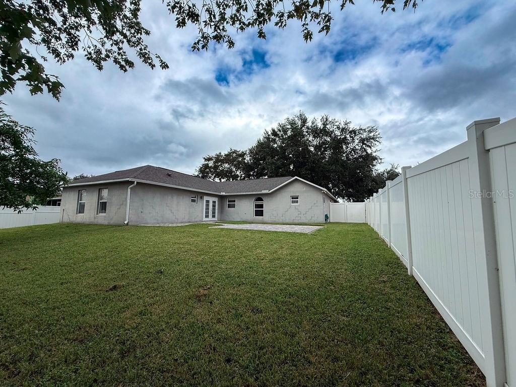 1723 Lochshyre Loop Ocoee, FL 34761 - Photo 21 of 23 a house view with garden space