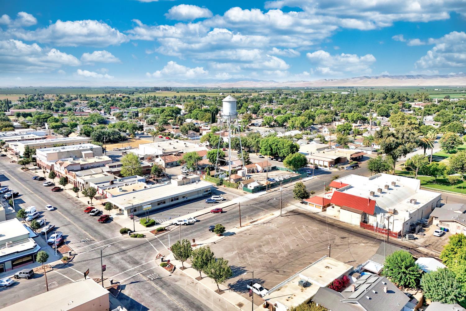 131 5th Street Gustine, CA 95322 - Photo 15 of 92 an aerial view of residential houses with outdoor space