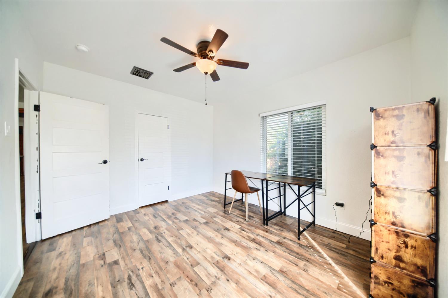 131 5th Street Gustine, CA 95322 - Photo 29 of 92 a view of a livingroom with furniture and a window