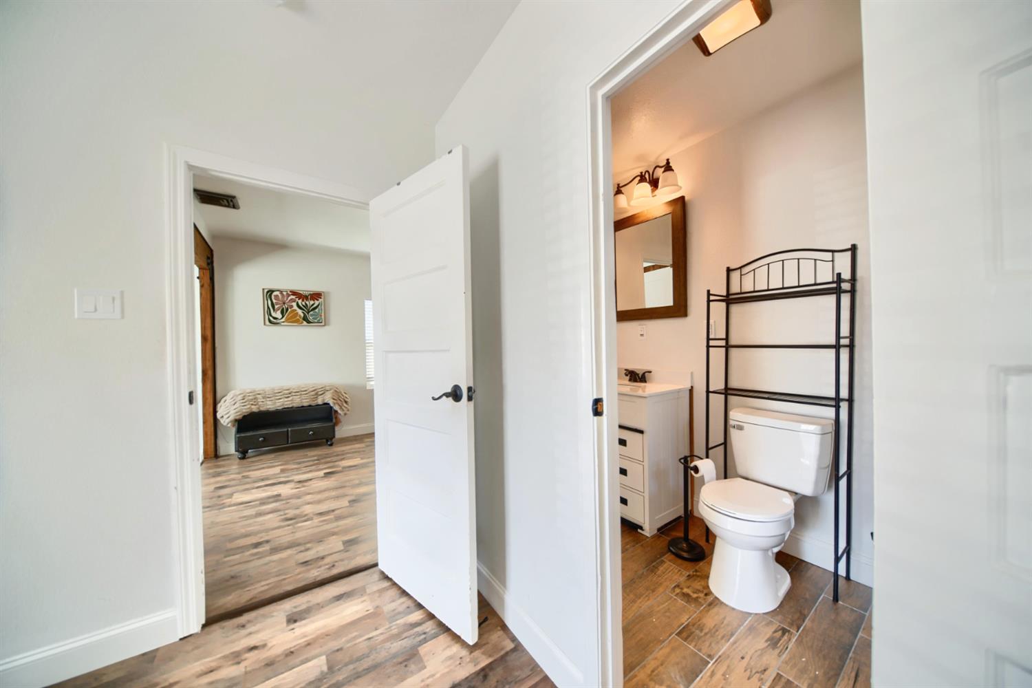 131 5th Street Gustine, CA 95322 - Photo 32 of 92 a bathroom with a toilet and a shower